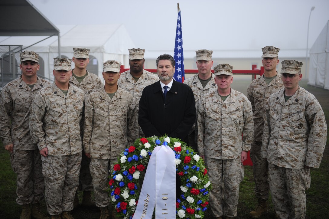 United States Marines, soldiers, airmen and representatives from several foreign countries participating in Combined Endeavor 2010 stand in formation during a September 11th remembrance ceremony, Sept. 11, 2010, in Grafenwoehr, Germany. Combined Endeavor 2010 is the world's largest communications interoperability exercise, preparing international forces' command, control, communications and computer systems for multinational operations. (U.S. Air Force Photo by Staff Sgt. Tim Chacon)