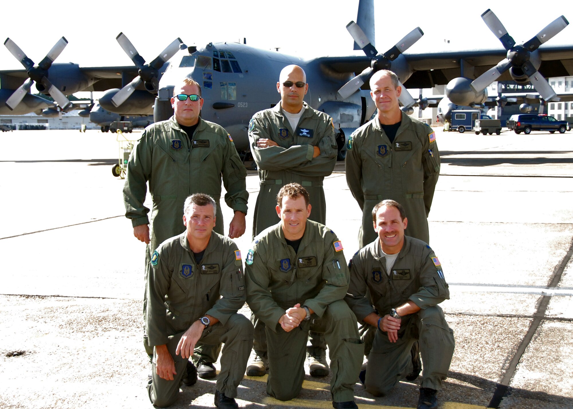 Duke Field reservists of the MC-130E Combat Talon I aircrew "Daddy 05" were awarded the Air Force Association’s Lt. Gen. William H. Tunner Award as the Air Force’s best airlift aircrew for their efforts on a deployed mission in Afghanistan. The four-hour mission was a medical evacuation flight into a hostile zone through a heavy snowstorm. Aircrew members pictured are (kneeling from left): Master Sgt. Bruce Callaway, Lt. Col. Daniel Flynn and Lt. Col. Timothy Broeking and (standing from left):  Master Sgt. Kevin Woodward, Chief Master Sgt. Michael Klausutis and Lt. Col. Thomas Frazier.  Crew members not shown: Lt. Col. Steven Jensen, Capt. Miriam Williams and Senior Master Sgt. Thomas Haddock.  (U.S. Air Force photo/Samuel King Jr.)