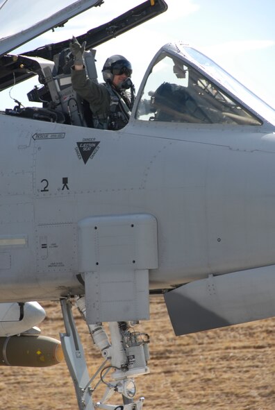 Maj. Todd Riddle, 303rd Fighter Squadron A-10 Thunderbolt II pilot, prepares for flight. The 303rd FS is part of the 442nd Fighter Wing, which deployed approximately 70 reservists to Hill Air Force Base, Utah for deployed facility training in August 2010. The 442nd FW is an Air Force Reserve unit at Whiteman AFB, Mo. (U.S. Air Force photo/Senior Airman Danielle Wolf)