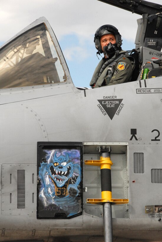 Maj. Todd Riddle checks the left engine on an A-10C Thunderbolt II prior to starting it at Hill Air Force Base, Utah, Aug. 30. The major, an A-10 pilot from the 303rd Fighter Squadron, was one of approximately 70 Air Force Reservists from the 442nd Fighter Wing who deployed to Hill for live-munitions training on the nearby Utah Test and Training Range.  The 442nd FW is an Air Force Reserve Command unit based at Whiteman Air Force Base, Mo.  (U.S. Air Force photo/Lt. Col. Dave Kurle)