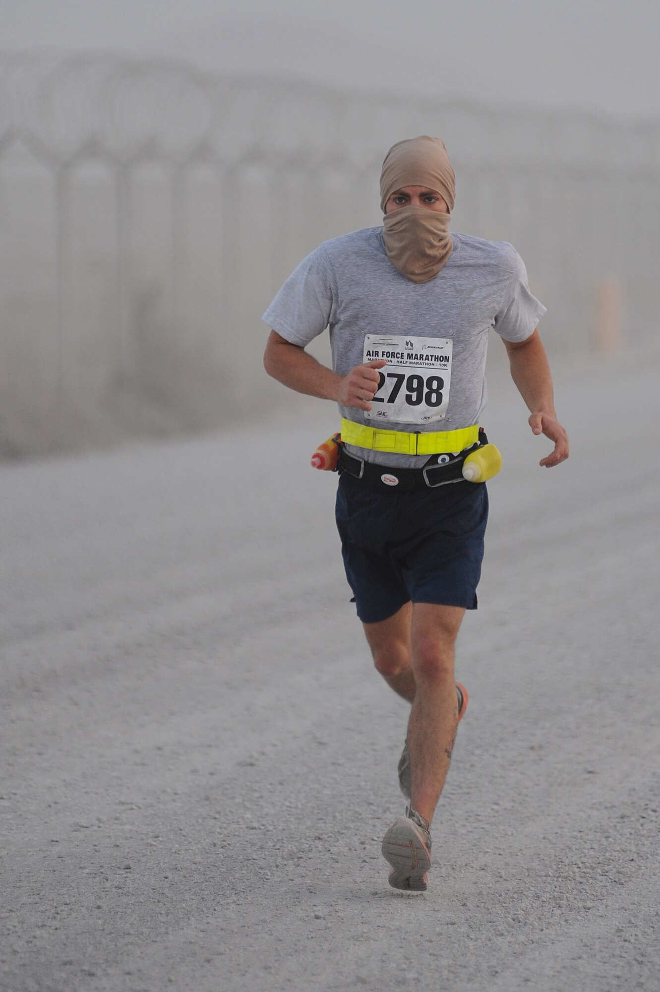Staff Sgt. Joe Daly runs around the flightline during the Air Force Marathon Sept. 11, 2010, at Kandahar Airfield, Afghanistan.  Sergeant Daly is assigned to the 451st Expeditionary Aircraft Maintenance Squadron. (U.S. Air Force photo by Tech. Sgt. Chad Chisholm/Released)