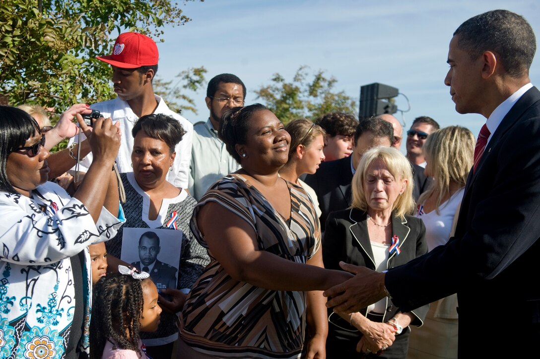 President Barack Obama shakes hands with family members of those lost during the Sept. 11, 2001, terror attack at the Pentagon following a Sept. 11, 2010, ceremony marking the ninth anniversary of the attacks.  