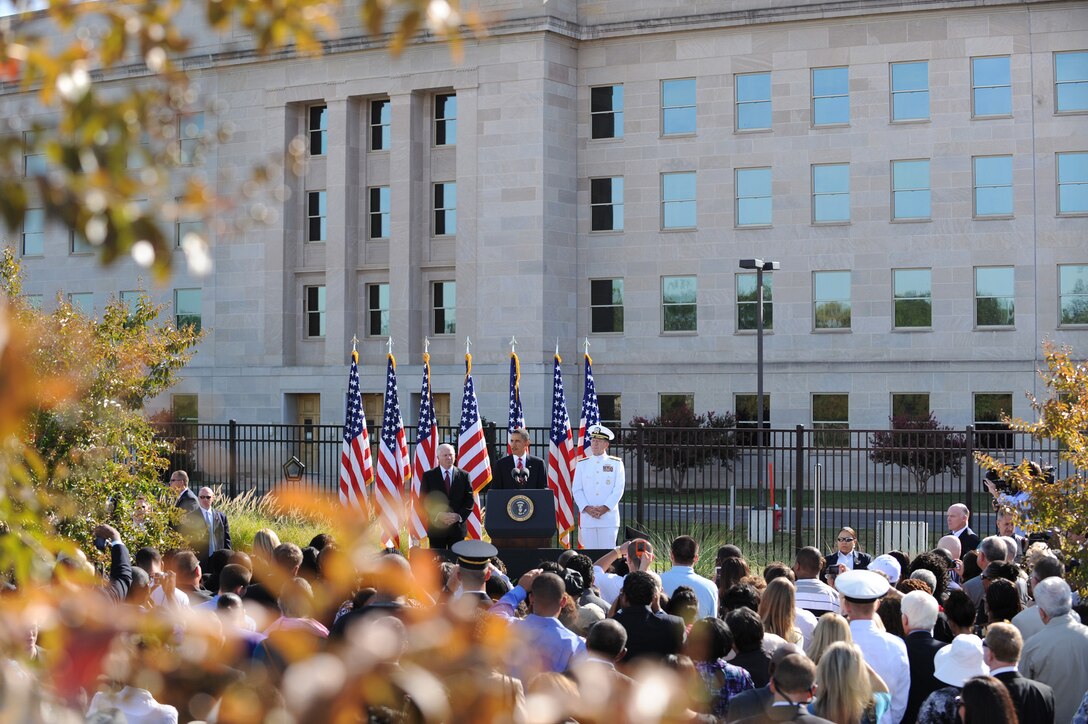 President Barack Obama speaks at the Pentagon, Sept. 11, 2010, on the occasion of the ninth anniversary of the terrorist attack on the building.  In the audience are family members of some of the 184 people who lost their lives here on a day very much like this bright, sunny, late summer's day.  