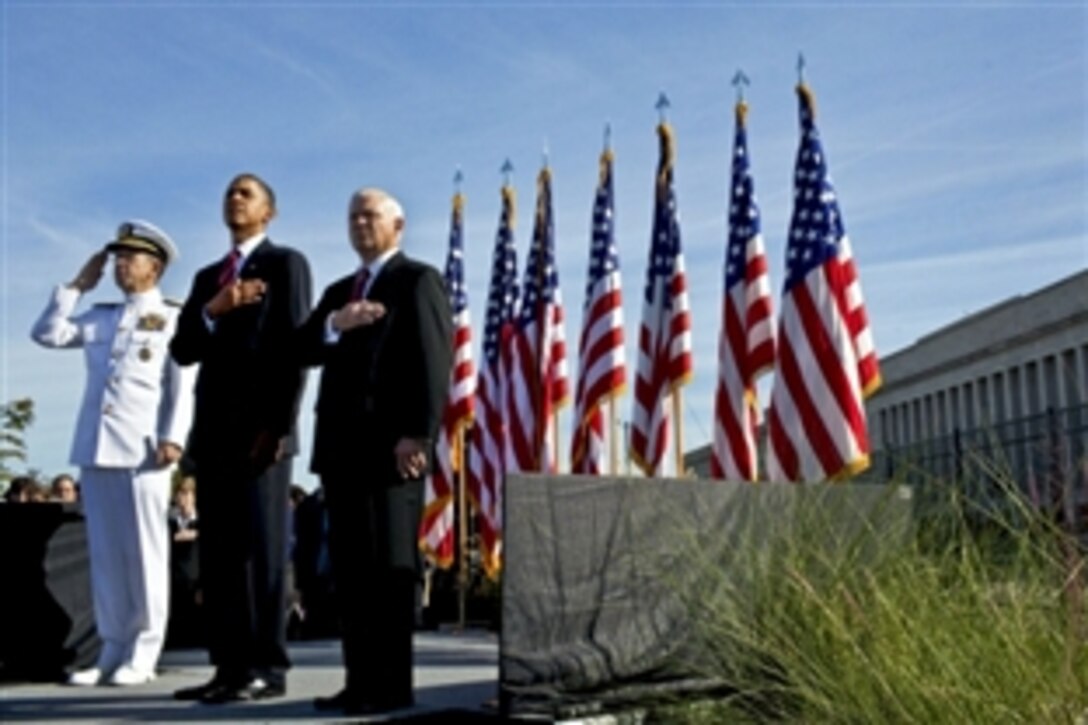 President Barack Obama, Defense Secretary Robert Gates, right, and Adm. Mike Mullen, chairman of the Joint Chiefs of Staff, honor, those who lost their lives at the Pentagon Memorial, Sept. 11, 2010.