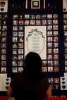 A woman looks at a 9/11 tribute quilt before an annual memorial luncheon held for him on the anniversary of his death, New York, Sept 11. Bucca is the only fire marshal killed in the line of duty. (Official Marine Corps photo by Sgt. Randall A. Clinton)