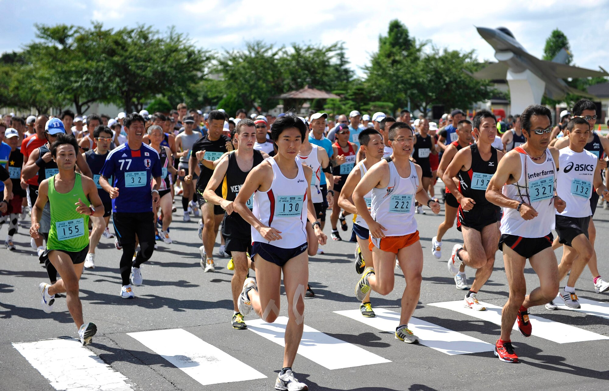 Area residents and base personnel run the 2nd annual Race the Base half-marathon Sept. 12, 2010, at Misawa Air Base, Japan. More than 1,300 runners participated in the event. (U.S. Air Force photo/Staff Sgt. Chad C. Strohmeyer/Released)