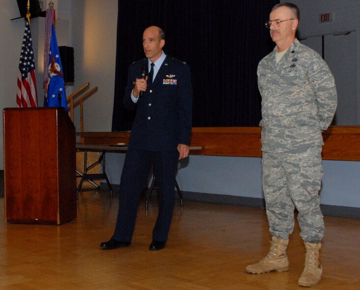 Lt. Col. Kenneth Chappelle, 50th Intelligence Squadron commander, accepts the Air Force Association’s Citation of Honor Award from Col. Jeffrey Mineo, 940th Wing commander, during commander's call, Sept. 11, at the Community Activity Center, Beale Air Force Base, Calif. (U.S. Air Force photo/Tech. Sgt. Kenneth McCann)