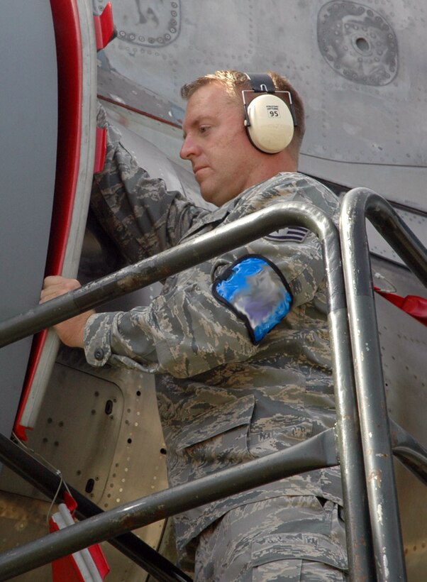 JOINT BASE LEWIS-MCCHORD, Wash. -- Staff Sgt. Paul Berglund, a crew chief with the 446th Aircraft Maintenance Squadron, installs an exhaust fan cover on a C-17 Globemaster in preparation for towing the aircraft to a maintenance hangar during a UTA here Sept. 11, 2010.  Sergeant Berglund lives in Clarkston, Wash. and commutes 343 miles every month to drill with the 446th Airlift Wing.  When not keeping Reserve aircraft in tip top shape, Sergeant Berglund works as a parts manager at a heating and air conditiong company in his civilian career. (U.S. Air Force photo/Staff Sgt. Grant Saylor)