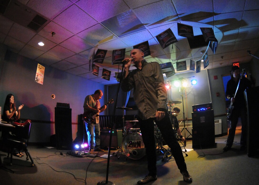 The Band UB North perform in a Battle of the Bands at the Falcon club September 11, 2010, Niagara Falls Air Reserve Station, Niagara Falls, NY. This event was coordinated by 914th Airlift Wing Services and is just one of many events being planned at the club to encourage club membership. (U.S. Air Force photo by Staff Sgt. Joseph McKee)