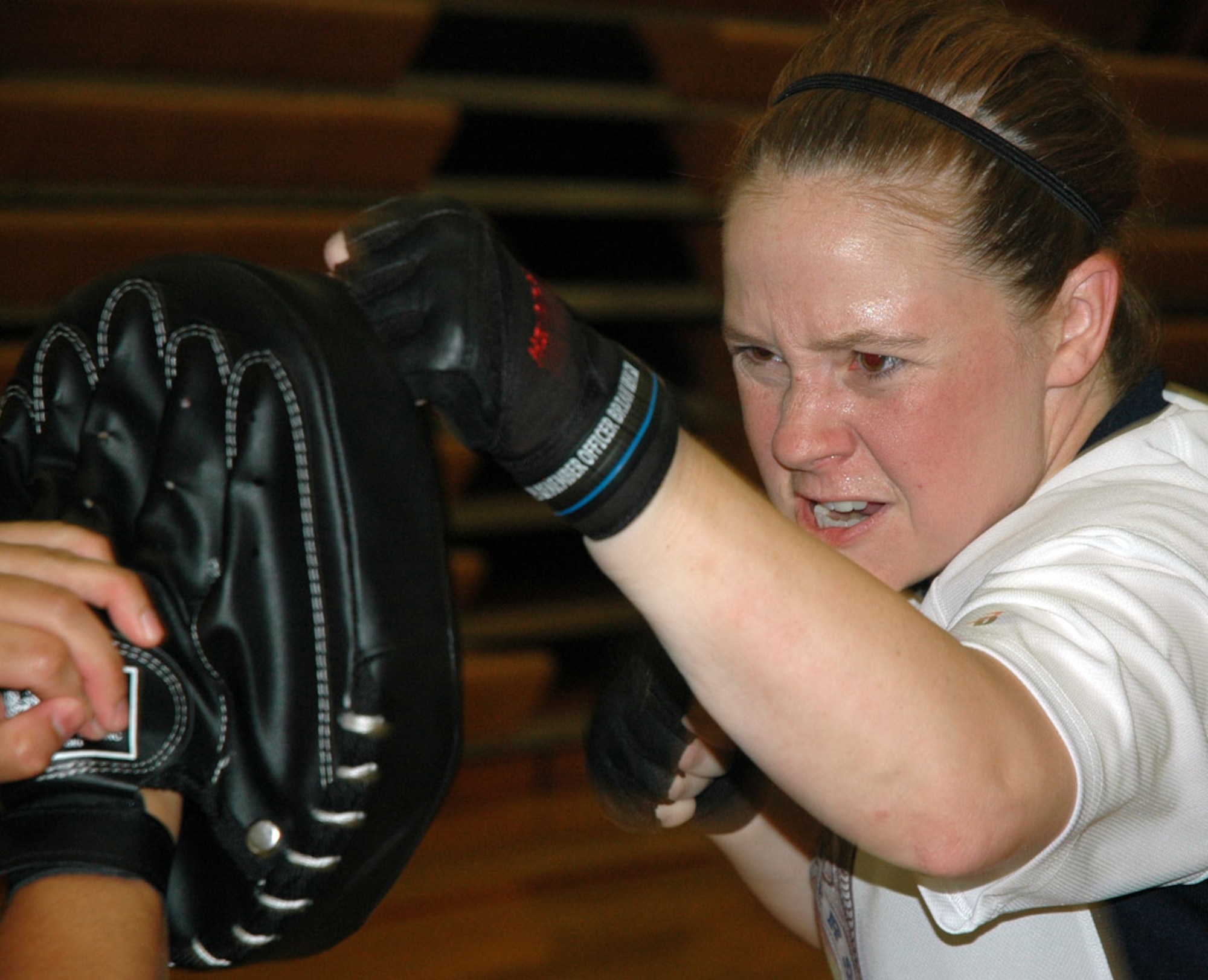 JOINT BASE LEWIS-MCCHORD, Wash. -- Tech Sgt. Vanessa Walsh throws a one-two combo during a defensive tactics refresher training course here Sept. 12, 2010.  Sergeant Walsh and her fellow Reservists from the 446th Security Forces Squadron gained valuable insight into modern defensive tactics during the course. 