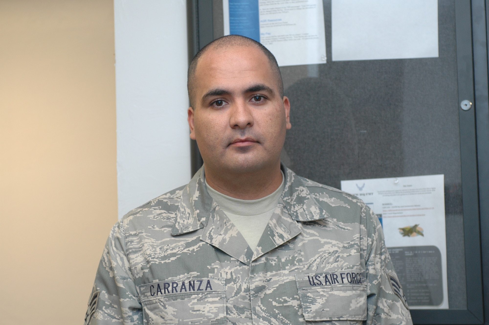 Senior Airman Ruben Carranza, 162nd Financial Management - Airman Carranza was listening to the radio at a civilian job when he found out about the attacks. Having no access to a television, he didn’t actually know what happened until his wife picked him up from work. The first words to come out of her mouth were about the attacks. They spent the rest of the day watching the news. “I remember just watching the news for the whole afternoon with my wife. We just kept watching the replay of the towers falling over and over again. I think we fell asleep watching the news without talking about anything else. It was that big of an impact.” (Air Force photo by Airman 1st Class Krystal Tomlin) 
