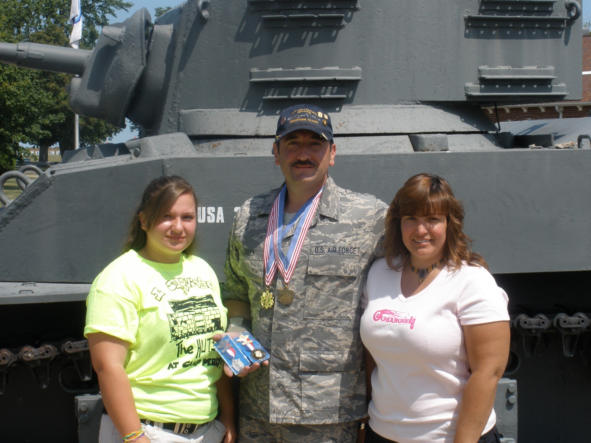 Technical Sgt. Chris Ashley pictured with his daughter Kayla Ashley and wife Karen Ashley at the President's 100 Match Camp Perry, Ohio.