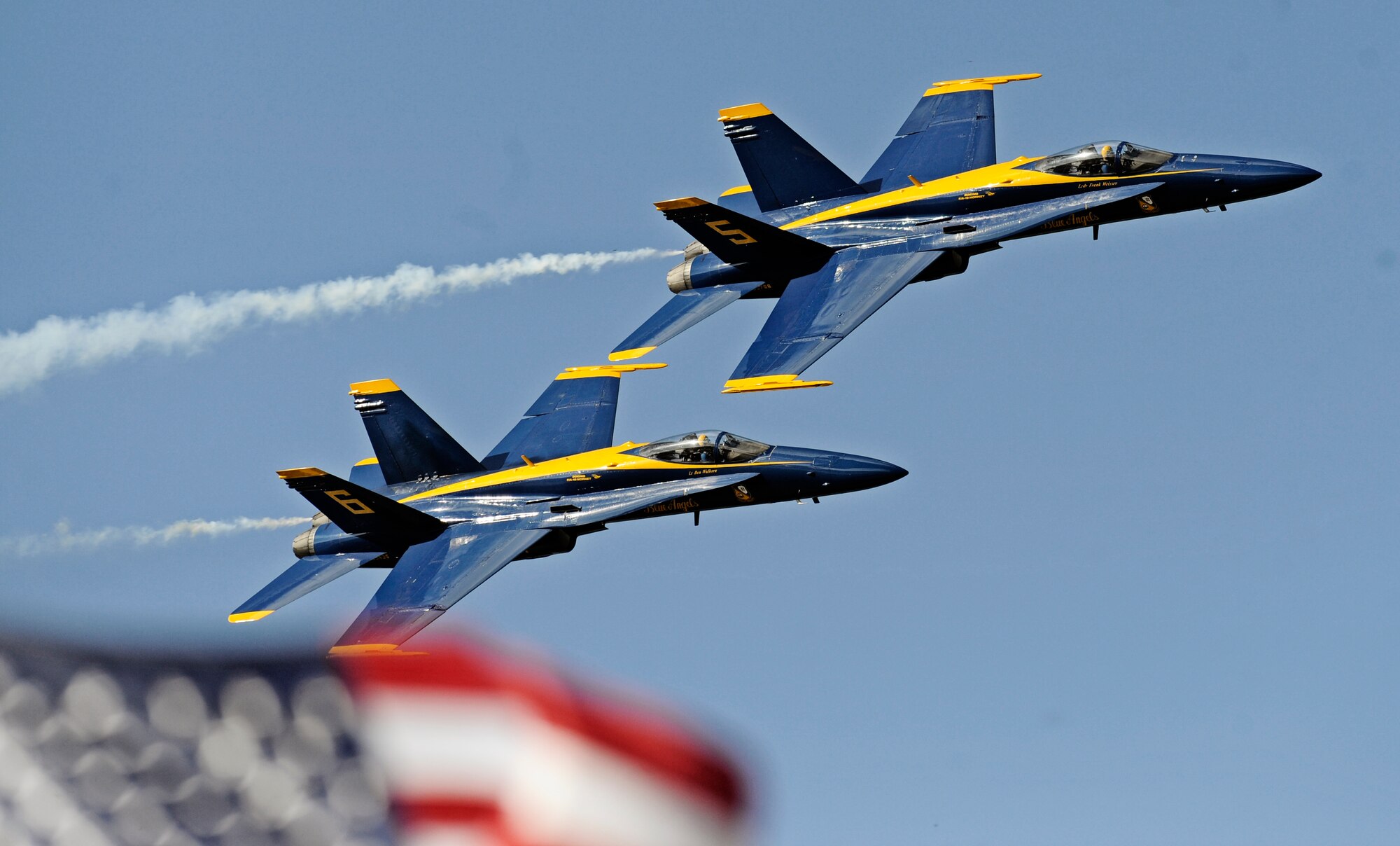 SCOTT AIR FORCE BASE, Ill. -- The Navy Blue Angels perform during the 2010 Airpower Over the Midwest Air Show Sept. 11. Other headlining acts included the Army Golden Knights Parachute Team and the Tora! Tora! Tora!, a reenactment of the Dec. 7, 1941, attack on Pearl Harbor with pyrotechnic explosions.  (U.S. Air Force photo/Staff Sgt. Ryan Crane)