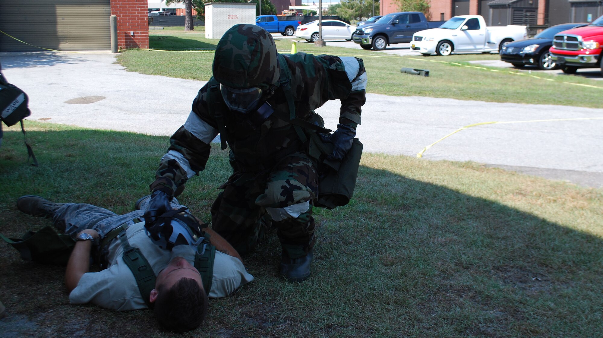 An Airman from the 315th Airlift Wing places a protective mask on a simulated casualty following a simulated attack during an operational readiness exercise here Sept. 11, 2010. Charleston's operational readiness inspection is scheduled to take place Nov. 29 - Dec. 6, 2011, which signals the beginning of the ORI prep season for Airmen in the 315th Airlift Wing. As part of the preparation emergency managers from throughout 22nd Air Force are here to proactively train Reservists. During this weekend’s unit training assembly multiple exercises were conducted to assess the wing’s ability to survive & operate. (U.S. Air Force photo/Capt. Bryan Lewis)