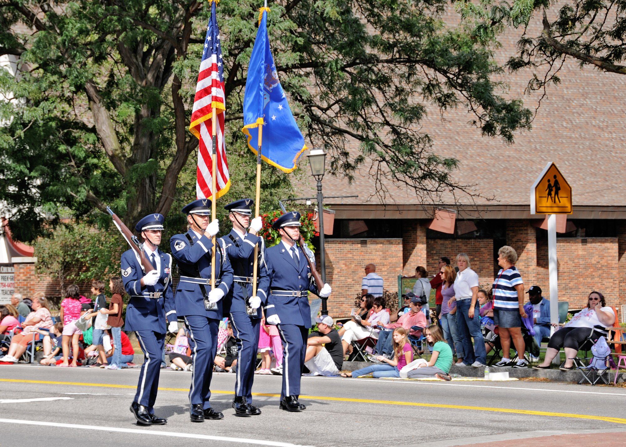 Members of the 914th Niagara Falls Air Reserve Color Guard march in the 53rd annual Niagara County Lewiston Kiwanis Peach Festival parade September 11, 2010 Lewiston N.Y.  The parade traveled down Center Street in the Village of Lewiston to the site of this year’s peach festival. (U.S. Air Force photo by Staff Sgt. Joseph McKee)