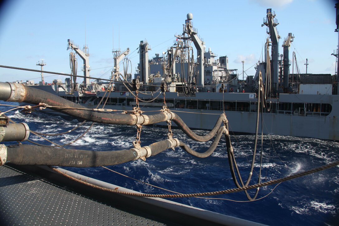 USNS John Lenthall refuels and resupplies USS Ponce in the Mediterranean Sea,  Sept. 12, 2010.  26th Marine Expeditionary Unit deployed aboard the ships of the Kearsarge Amphibious Ready Group in late August responding to an order by the Secretary of Defense to support Pakistan flood relief efforts.