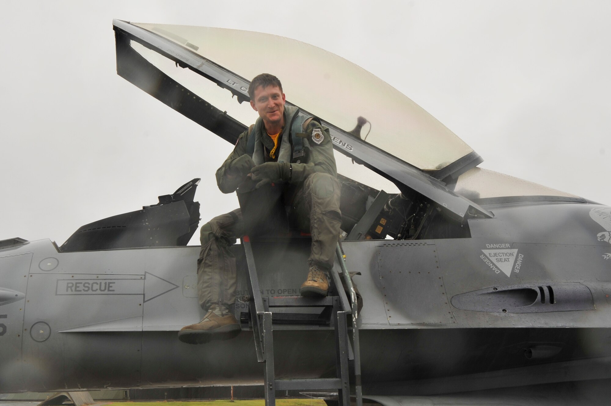 U.S. Air Force Lt. Col. Aaron Steffens, 14th Fighter Squadron commander, climbs out of his F-16 Flying Falcon Sept. 11, 2010, as he returns from a six-month deployment to Kunsan Air Base, Korea. (U.S. Air Force photo/Tech. Sgt. Russell McBride/Released)