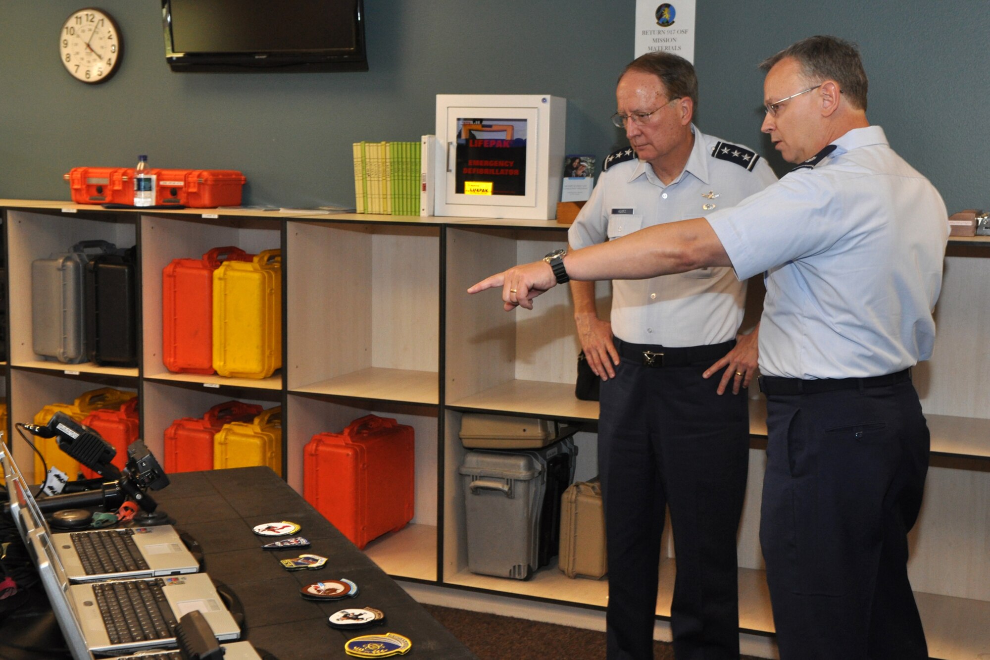 Lt. Col. Joseph Jones, 93rd Bomb Squadron commander, talks to Lt. Gen. Frank G. Klotz, commander, Air Force Global Strike Command, about some of the equipment used by B-52 Stratofortress crews at the 93rd BS headquarters during an orientation visit about the Air Force Reserves at Barksdale Air Force Base, La., on Aug. 23. After a wing briefing by 917th Wing Commander Col. John J. Mooney III, at the 917th Wing Headquarters, General Klotz took an abbreviated tour of some of the 917th Wing assets on Barksdale. (U.S. Air Force photo/Tech. Sgt. Jeff Walston) 