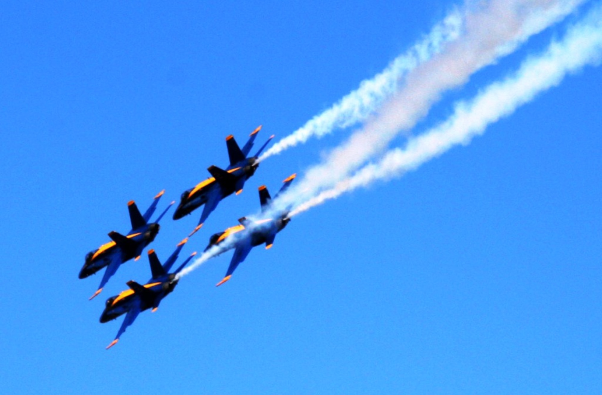 The U.S. Navy's Blue Angels aerial demonstration team performs during the 2010 Airpower Over The Midwest Airshow on Sept. 11, 2010, at Scott Air Force Base, Ill. Tens of thousands of people attended the two-day airshow. (U.S. Air Force Photo/Master Sgt. Scott T. Sturkol)