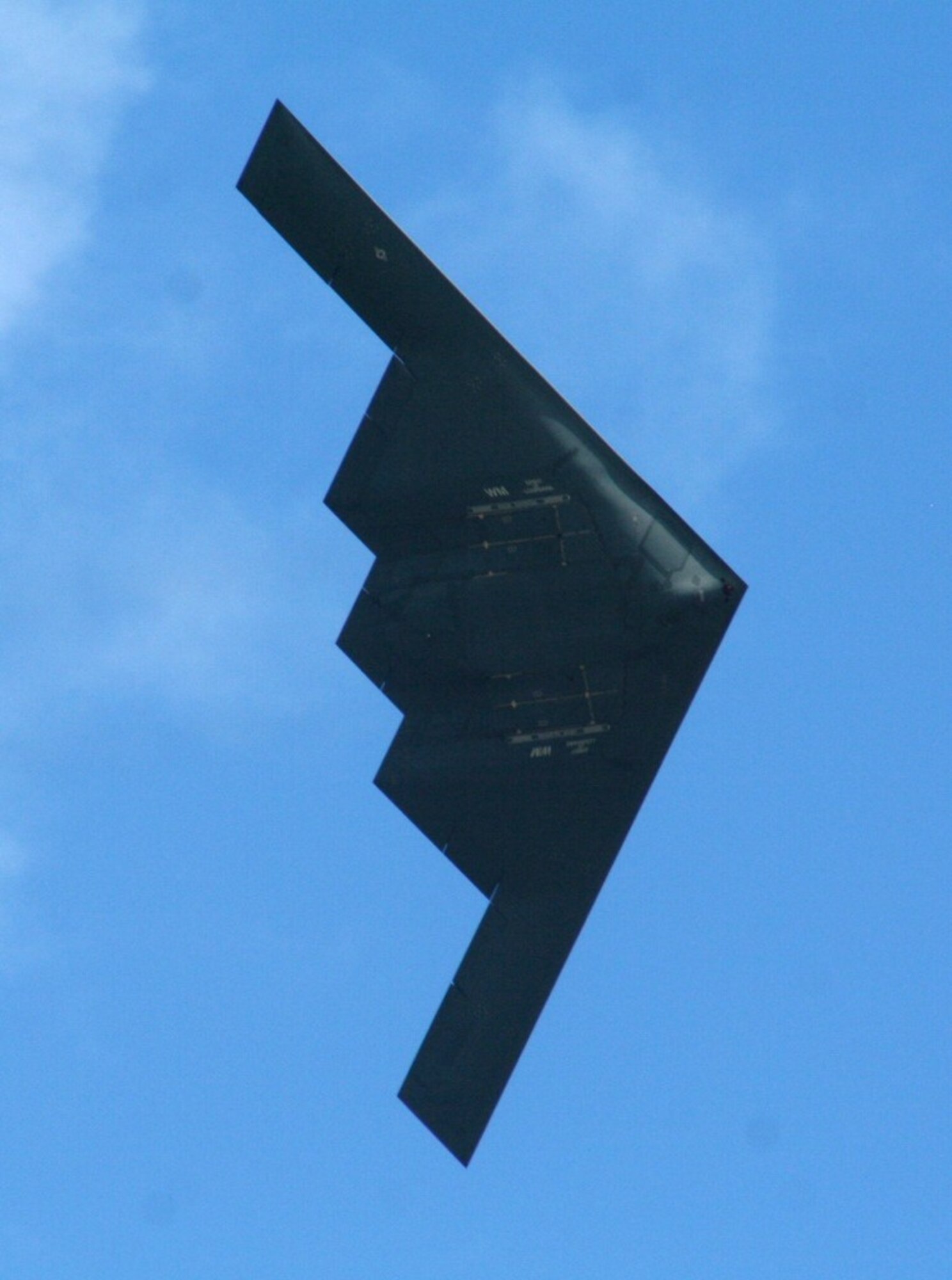 An aircrew flies a B-2 Spirit from Whiteman Air Force Base, Mo., over the airfield as part of an aerial demonstration for the 2010 Airpower Over The Midwest Airshow on Sept. 11, 2010, at Scott AFB, Ill. Tens of thousands of people attended the two-day airshow. (U.S. Air Force Photo/Master Sgt. Scott T. Sturkol)