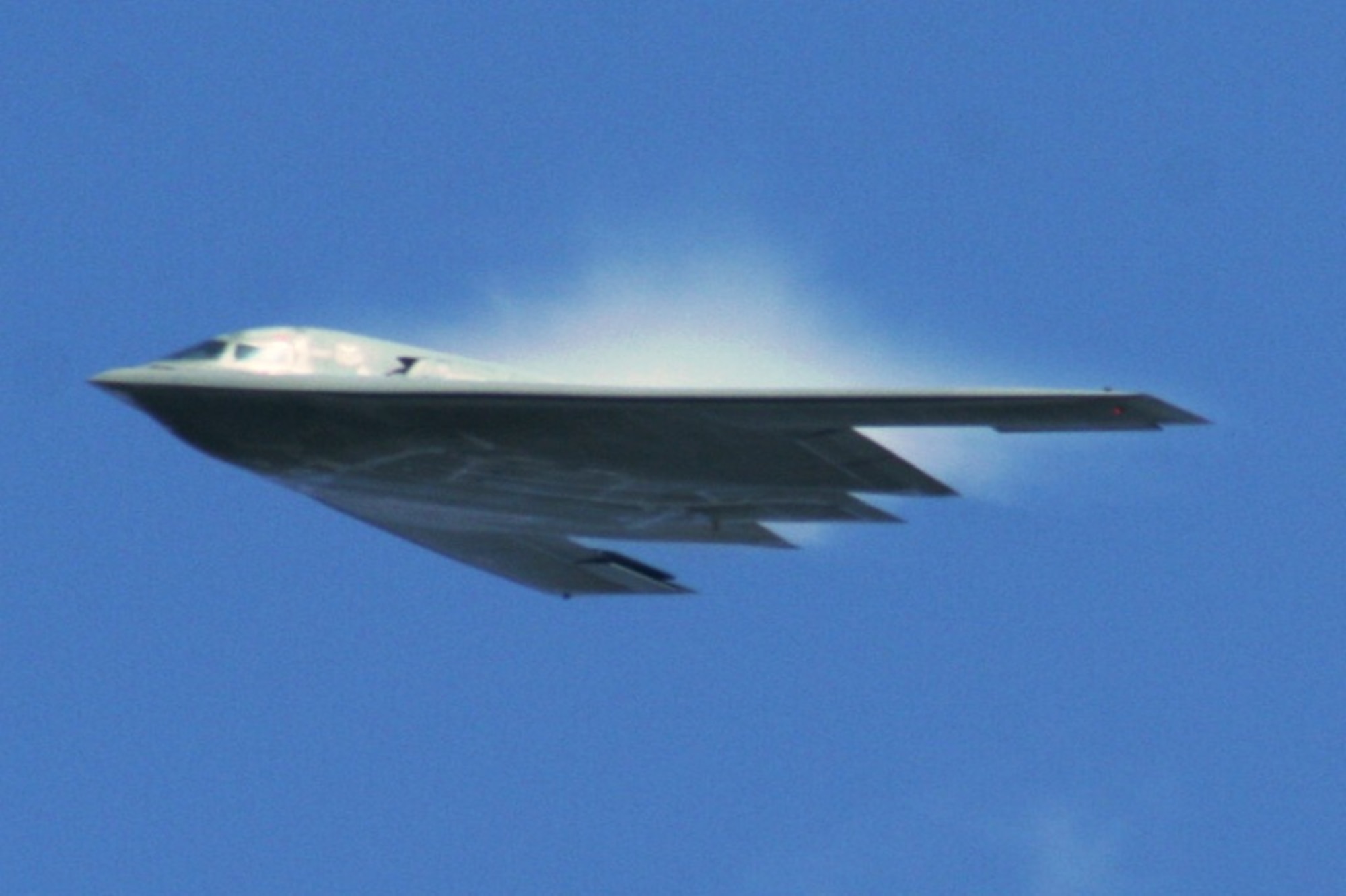 An aircrew flies a B-2 Spirit from Whiteman Air Force Base, Mo., over the airfield as part of an aerial demonstration for the 2010 Airpower Over The Midwest Airshow on Sept. 11, 2010, at Scott AFB, Ill. Tens of thousands of people attended the two-day airshow. (U.S. Air Force Photo/Master Sgt. Scott T. Sturkol)