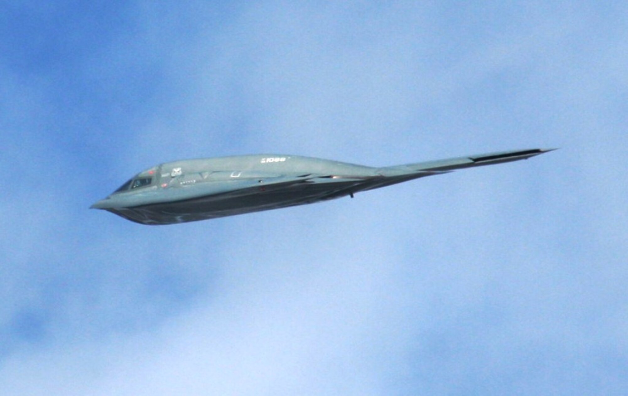 An aircrew flies a B-2 Spirit from Whiteman Air Force Base, Mo., over the airfield as part of an aerial demonstration for the 2010 Airpower Over The Midwest Airshow on Sept. 11, 2010, at Scott AFB, Ill. Tens of thousands of people attended the two-day airshow. (U.S. Air Force Photo/Master Sgt. Scott T. Sturkol)