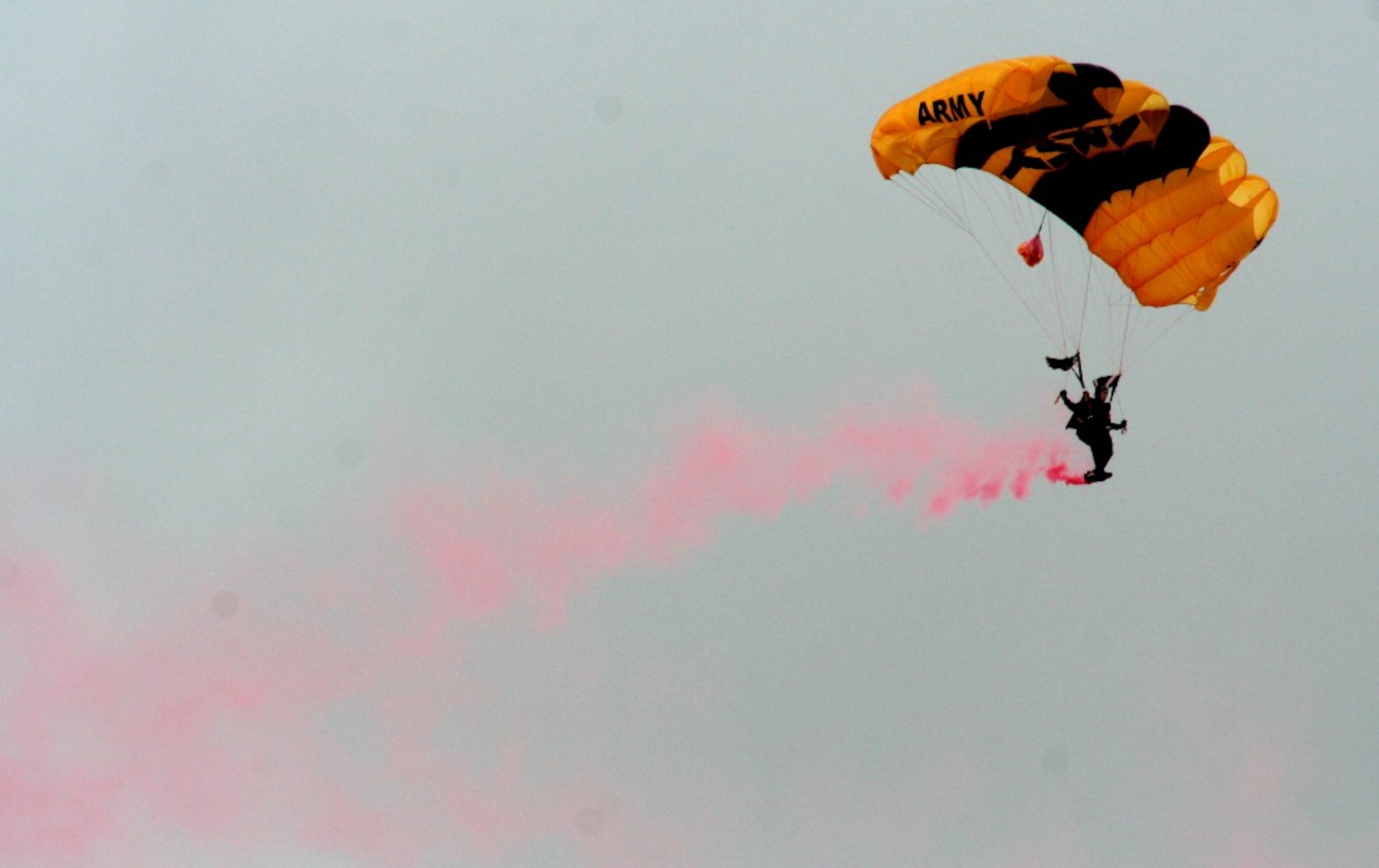 A Soldier from the U.S. Army's Golden Knights performs during the 2010 Airpower Over The Midwest Airshow on Sept. 11, 2010, at Scott Air Force Base, Ill. Tens of thousands of people attended the two-day airshow. (U.S. Air Force Photo/Master Sgt. Scott T. Sturkol)