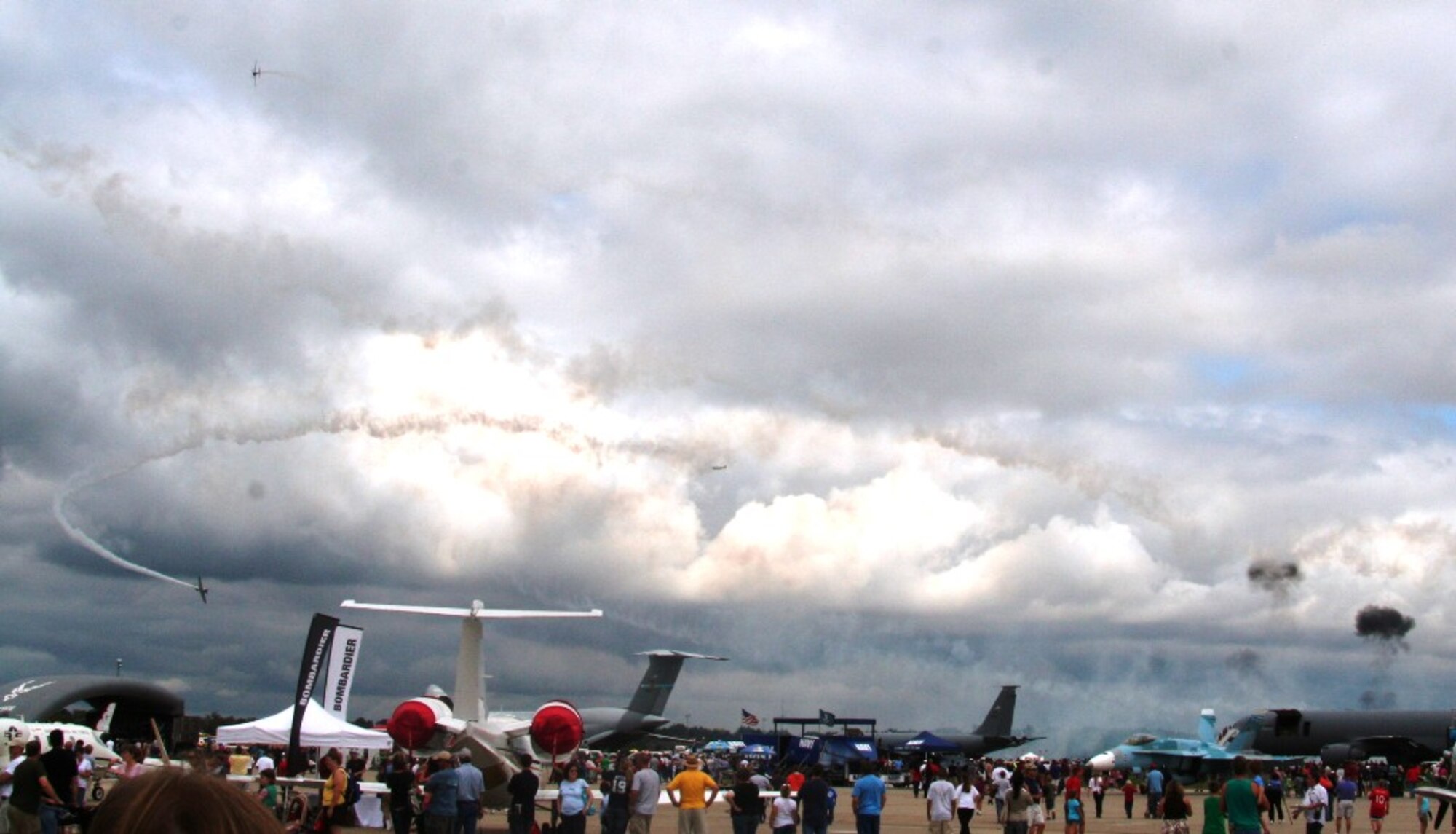 Vintage World War II-era aircraft flies through the air during the "Tora! Tora! Tora!" aerial demonstration by the Commemorative Air Force for the 2010 Airpower Over The Midwest Airshow on Sept. 11, 2010, at Scott Air Force Base, Ill. The demonstration re-enacts the Pearl Harbor attack. Tens of thousands of people attended the two-day airshow. (U.S. Air Force Photo/Master Sgt. Scott T. Sturkol)