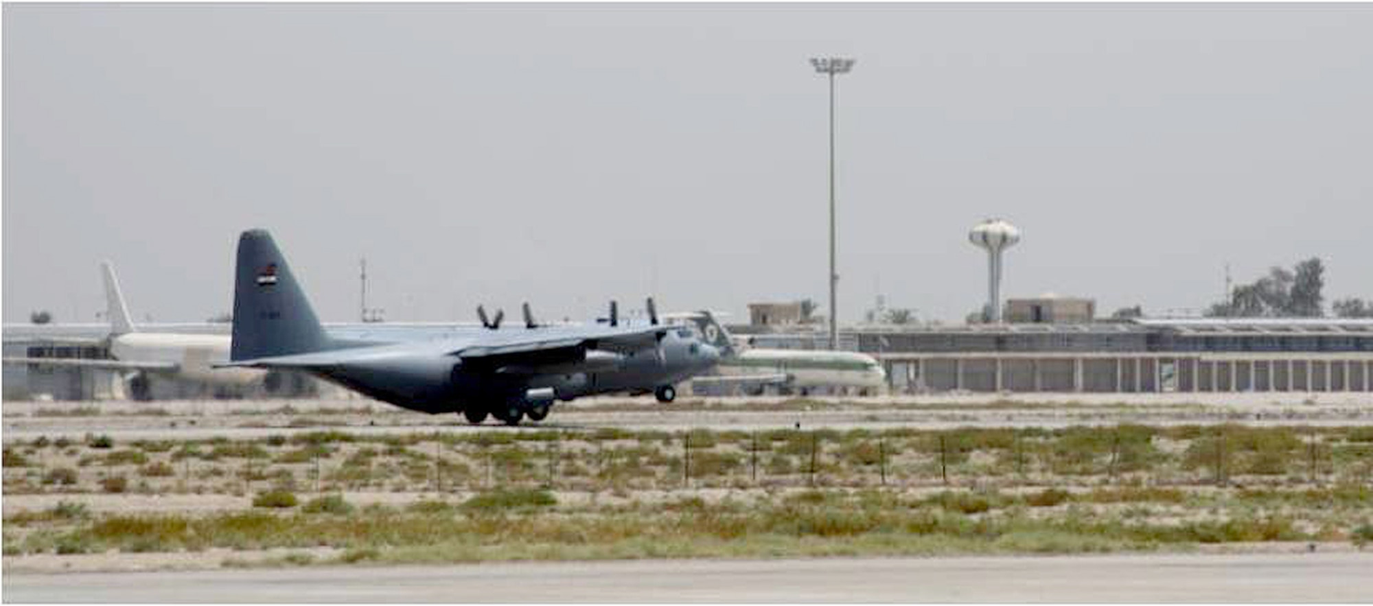 An Iraqi C-130 takes off from New Al Muthana Air Base, Baghdad, Sept. 1, 2010, with the inaugural class of cadets bound for the recently re-built Iraqi Air Force College in Tikrit. (U.S. Air Force photo)