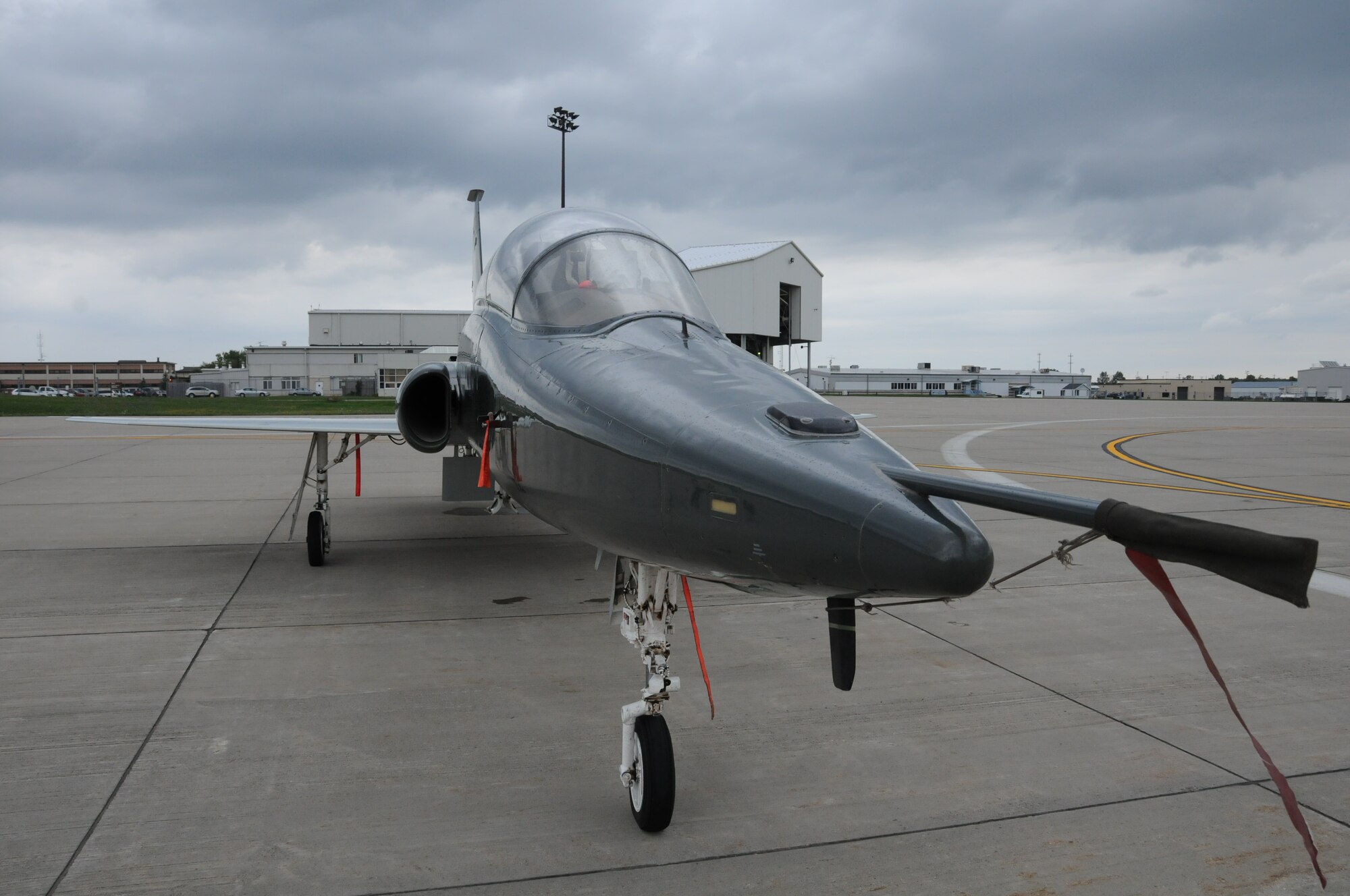 A T-38 Talon jet from Vance Air Force Base, Oklahoma sits near the flightline at The Niagara Falls Air Reserve Stationa flyover at Ralf Wilson Stadium, Orchard park, N.Y. Sunday.

The T-38 Talon is a twin-engine, high-altitude, supersonic jet trainer used in a variety of roles because of its design, economy of operations, ease of maintenance, high performance and exceptional safety record. 

Air Education and Training Command is the primary user of the T-38 for joint specialized undergraduate pilot training. Air Combat Command, Air Force Materiel Command and the National Aeronautics and Space Administration also use the T-38A in various roles.
