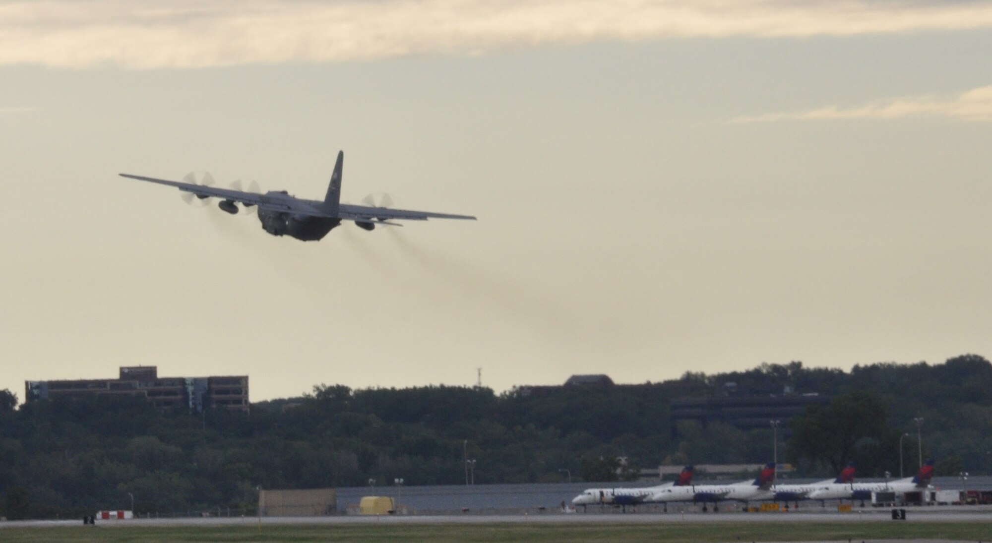 A 934th Airlift Wing C-130 departs Minneapolis St. Paul International Airport to Southwest Asia Sept. 10.  (Air Force Photo/Paul Zadach)