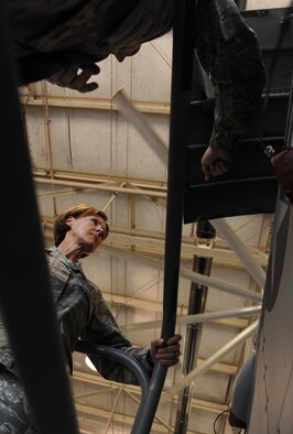 MOODY AIR FORCE BASE, Ga. -- Capt. Jordan Smyth, 75th Aircraft Maintenance Unit officer in charge, explains the electric circuitry inside an A-10C Thunderbolt II aircraft to Maj. Gen. Judith Fedder, Air Combat Command director of logistics, during her base visit to Moody Air Force Base, Ga., Sept. 9. (U.S. Air Force photo/Airman 1st Class Benjamin Wiseman) 