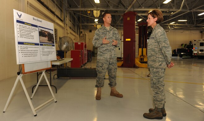 MOODY AIR FORCE BASE, Ga. -- Airman 1st Class Ryan King, 23rd Logistics Readiness Squadron vehicle equipment mechanic, explains the effects of biodiesel fuel when used by diesel-operated vehicles to Maj. Gen. Judith Fedder, Air Combat Command director of logistics, during her visit to Moody Air Force Base, Sept. 9. General Fedder spent her day-long trip visiting various logistics-related shops on base. (U.S. Air Force photo/Airman 1st Class Benjamin Wiseman) 