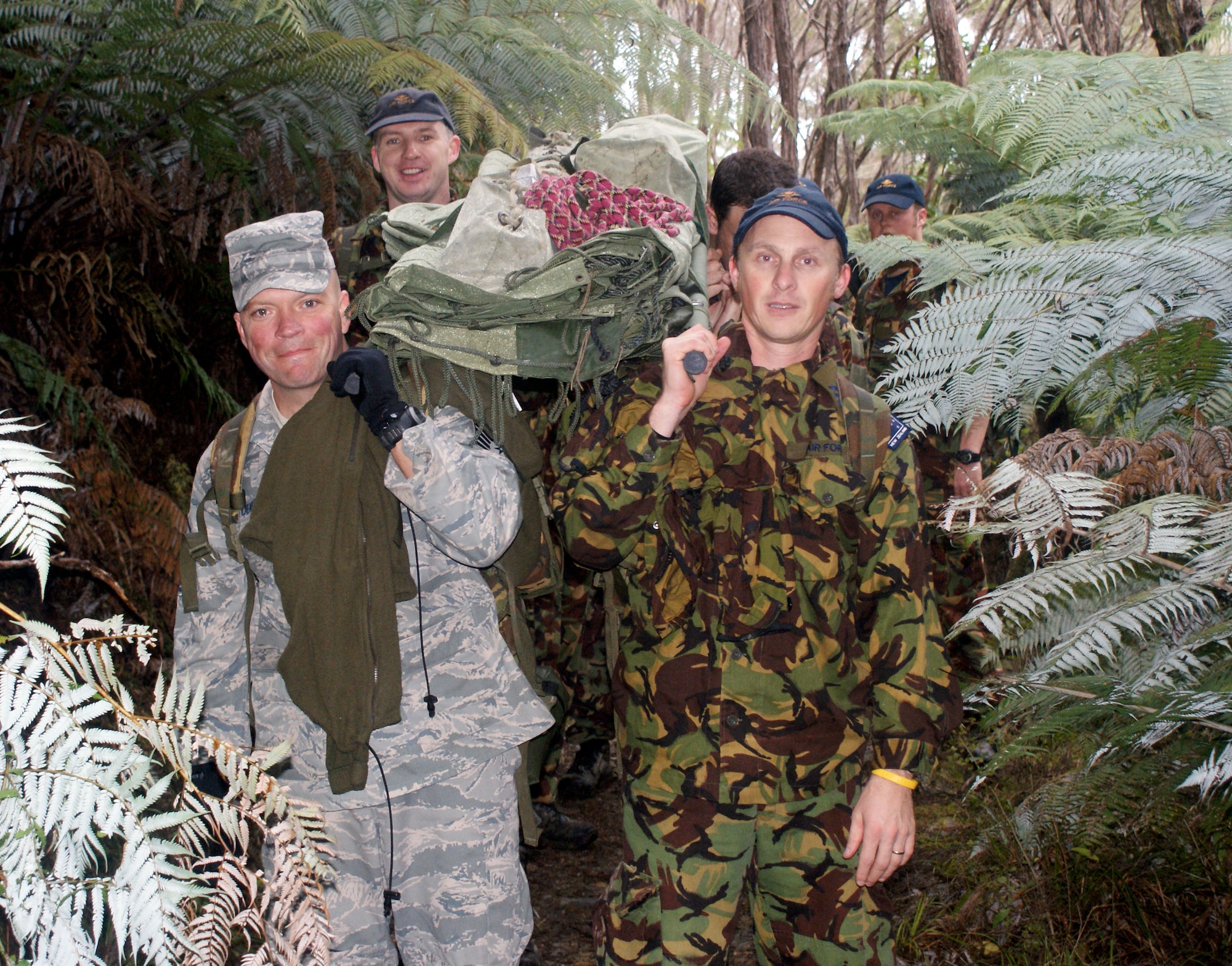 Master Sgt. Clete Toensing, 15th Wing Professional Military Education Center
director of operations (in the Airman Battle Uniform), participates in the
Royal New Zealand Air Force's Warrant Officer school. The school is 19 days
long and is currently under evaluation as to whether it can be used as a professional dvelopment opportunity for Airmen. (Courtesy photo)
