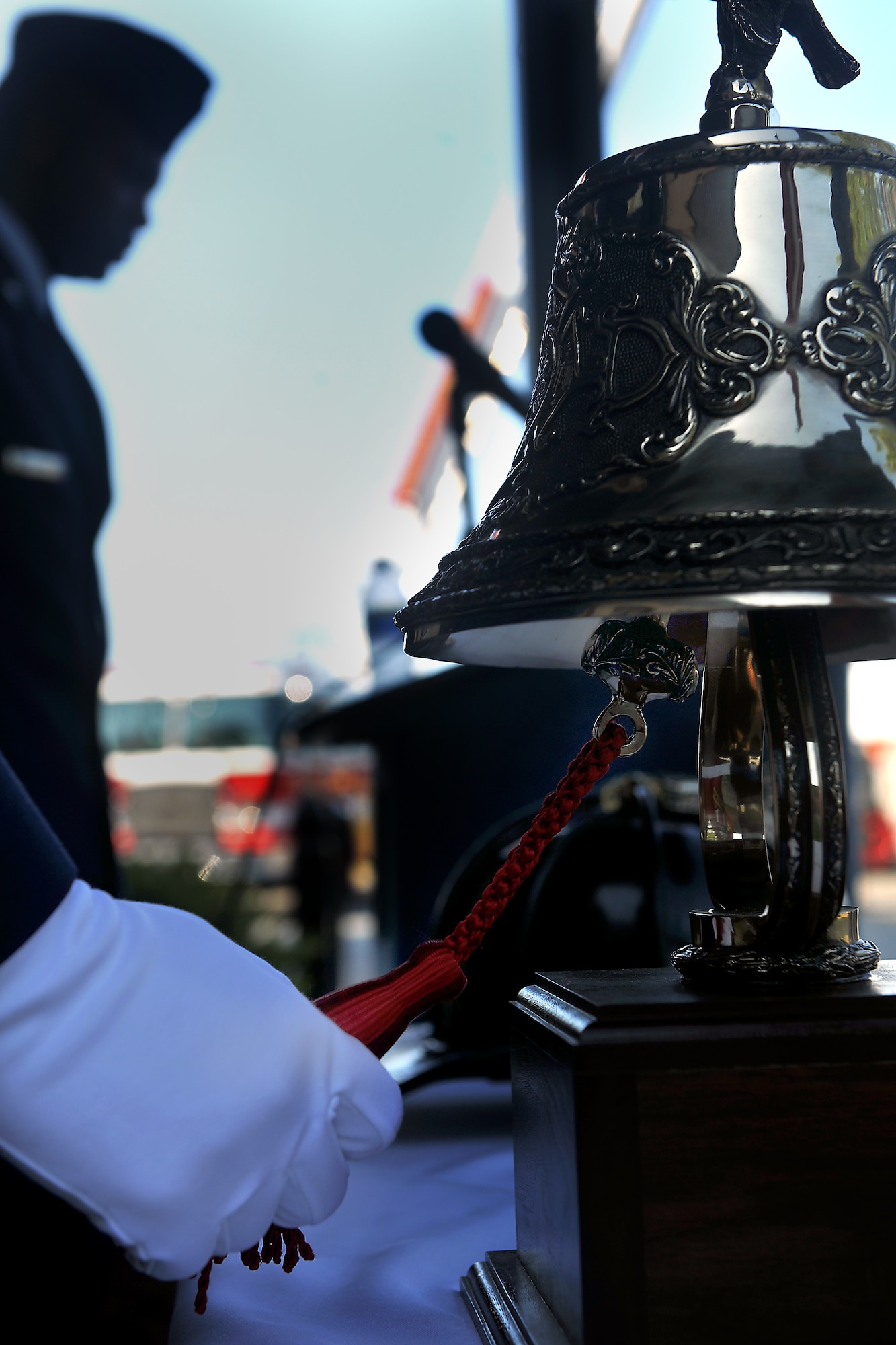 MOODY AIR FORCE BASE, Ga. -- Senior Airman Carlos Tirado, 23rd Civil Engineer Squadron firefighter, rings a fire bell symbolizing the last call for fallen firefighters during a 9/11 ceremony here Sept. 11. The annual ceremony honors the heroes who lost their lives during the events of Sept. 11, 2001. (U.S. Air Force photo/Airman 1st Class Joshua Green)
