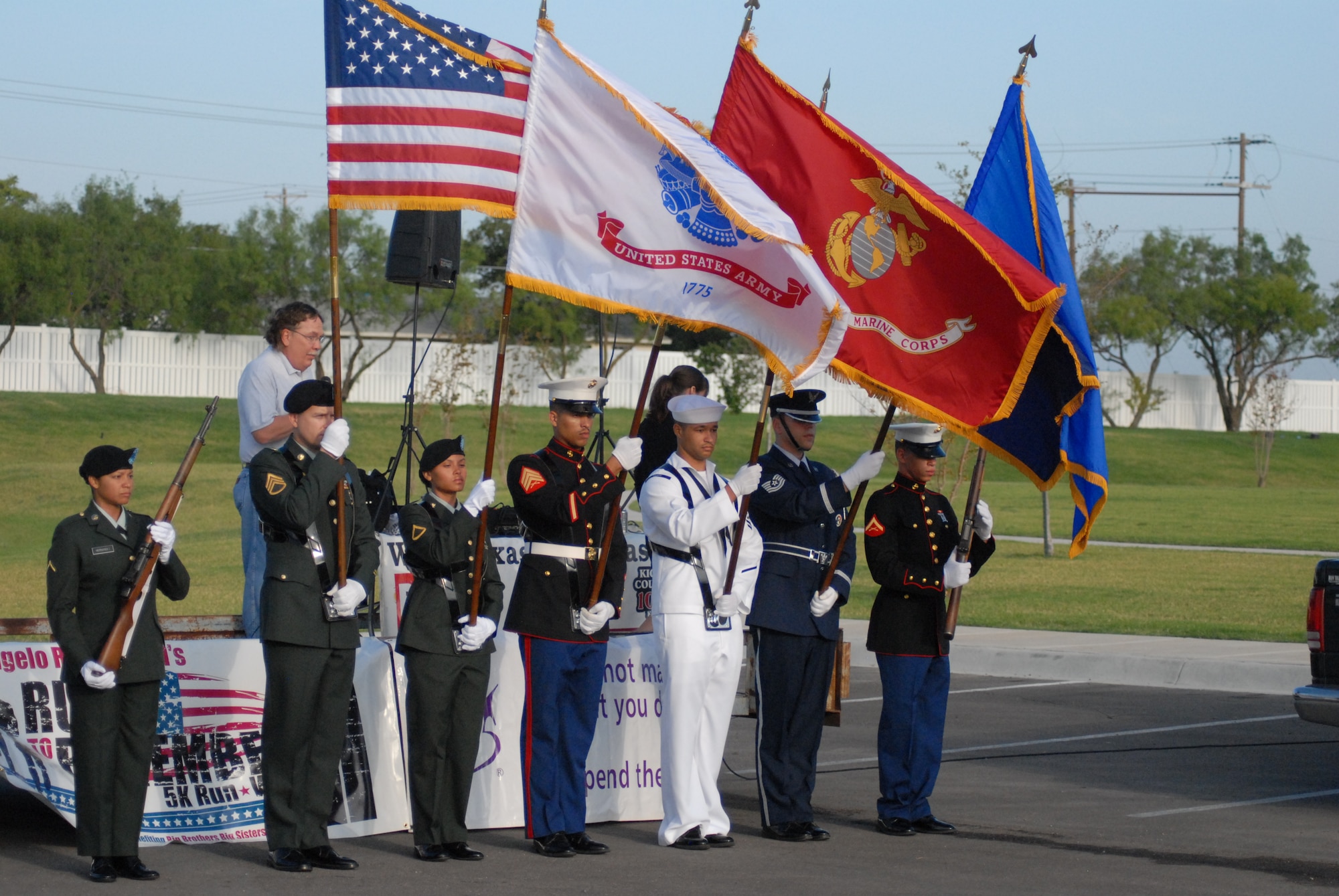 Goodfellow Joint Service Color Guard presents the Colors at the start of the Big Brothers, Big Sisters 9/11 Memorial Run at The Landings at Goodfellow Sept. 11. (U.S. Air Force photo/Connie Hempel)