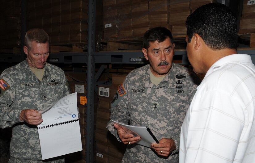 SOTO CANO AIR BASE, Honduras --  Col. Gregory Reilly, the Joint Task Force-Bravo commander, left, and Maj. Gen. Simeon Trombitas receive a mission briefing from Mr. Victor Vega, the U.S. Army South equipment manager, here Sept. 11. General Trombitas took command of USARSO on Nov. 9, 2009. (U.S. Air Force photo/Tech. Sgt. Benjamin Rojek)