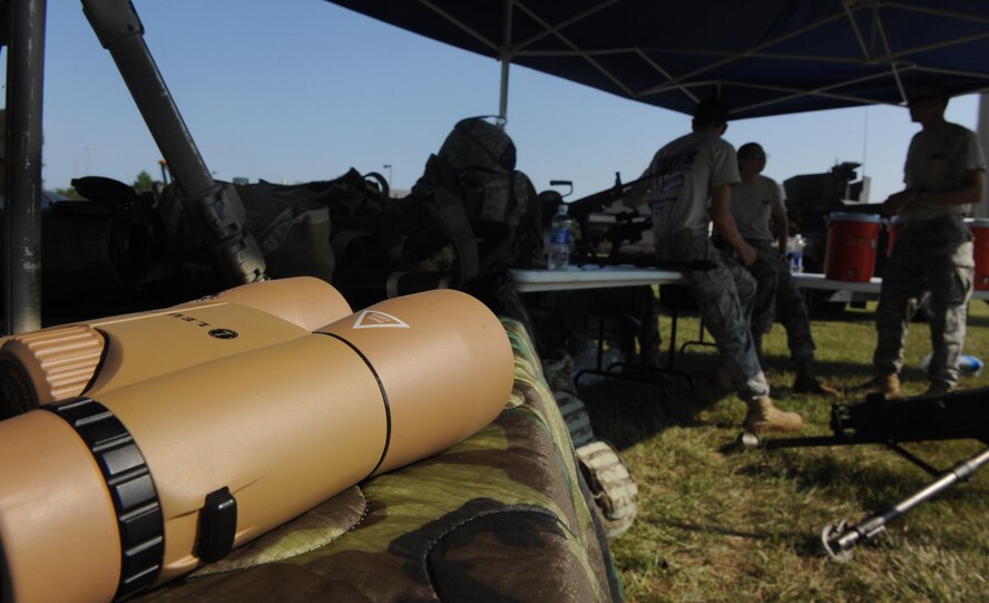 MOODY AIR FORCE BASE, Ga. -- The 820th Security Forces Group and the 38th Rescue Squadron display their equipment during the Kids Deployment Line here Sept. 11. Children were able to get inside the turret of an 820th SFG Humvee and also see the different weapons and equipment used during their deployments. (U.S. Air Force photo/Airman 1st Class Benjamin Wiseman)
