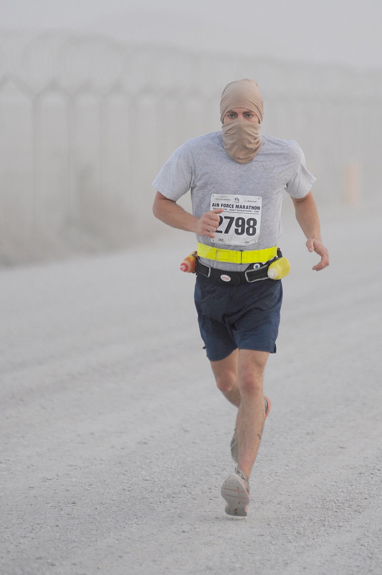 Staff Sgt. Joe Daly runs around the flightline during the Air Force Marathon Sept. 11, 2010, at Kandahar Airfield, Afghanistan. Sergeant Daly is assigned to the 451st Expeditionary Aircraft Maintenance Squadron. (U.S. Air Force photo/Tech. Sgt. Chad Chisholm)