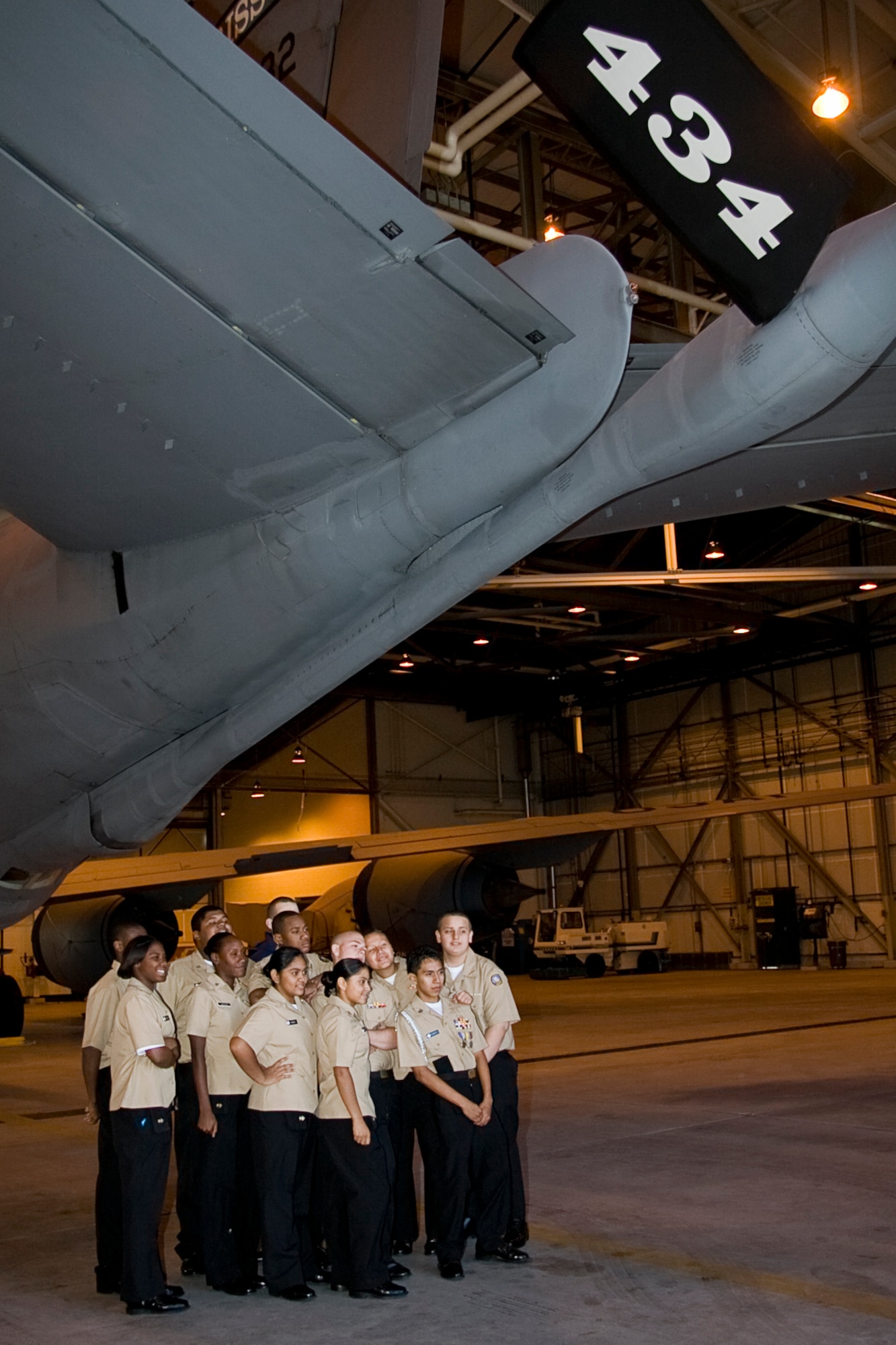 GRISSOM AIR RESERVE BASE, Ind. -- Cadets from the Navy Junior Reserve Officers Training Corps program at Proviso East High School in Maywood, Ill., pose for a photo under the boom pod of a KC-135R Stratotanker from the 434th Air Refueling Wing. The 434th ARW hosted the cadets as they toured the base to get a better understanding of day-to-day military operations and life. During the tour, the group was also able to tour the U.S. Marine Corps Reserve's Detachment 1, Communications Company, Headquarters and Service Battalion, 4th Marine Logistics Group located here. (U.S. Air Force photo/Tech. Sgt. Mark R. W. Orders-Woempner)