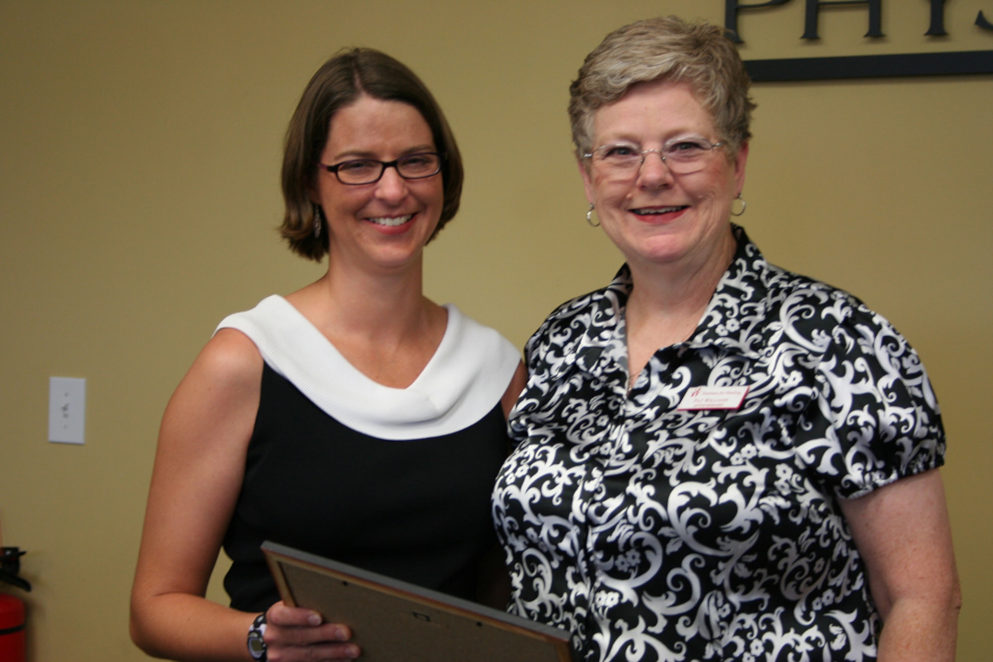 Cindy Prebola receives the Tullahoma Area Chamber of Commerce’s Extra Miler Award from Pat Williams, chair of the Extra Miler Committee and Chamber board member. Prebola is the recreational soccer director for the Tullahoma Soccer Association.