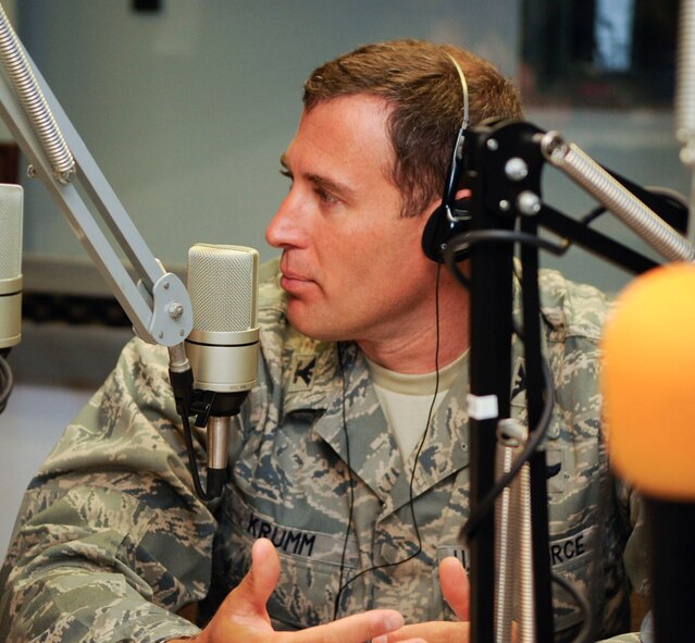 ALAMOGORDO, N.M. -- Col. David Krumm, the 49th Wing commander at Holloman Air Force Base, speaks as a guest on a KRSY AM radio show Sept. 9, 2010. During the radio show, the commander introduced himself to listeners in the local area and discussed recent and upcoming happenings on base. KRSY is one of many local radio stations that welcome guest visits from base leadership, providing a platform for communication between the base and local community. (U.S. Air Force photo by Senior Airman Sondra Escutia / Released)