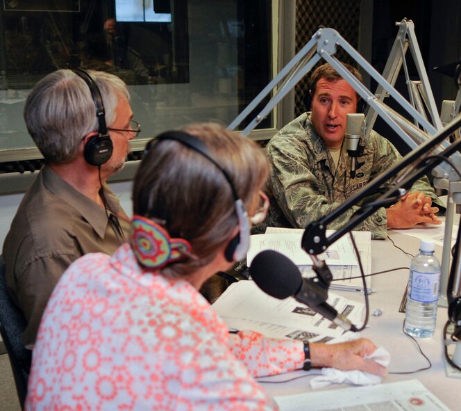 ALAMOGORDO, N.M. -- Col. David Krumm, the 49th Wing commander at Holloman Air Force Base, speaks to Mike Shinabery and Jean Vallance during a KRYS AM radio show Sept. 9, 2010. During the radio show, the commander introduced himself to listeners in the local area and discussed recent and upcoming happenings on base. His span of topics during the show ranged from the upcoming Oktoberfest hosted by the German Air Force, to the expanding Remotely Piloted Aircraft Formal Training Unit. He also spoke about Holloman's latest news regarding the F-16 Fighting Falcon training mission set to come on board in the future. (U.S. Air Force photo by Senior Airman Sondra Escutia / Released)