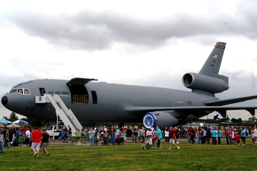 People attending the Airpower Over The Midwest Airshow line up to look at a static display of a KC-10 Extender from the 305th Air Mobility Wing at Joint Base McGuire-Dix-Lakehurst, N.J., on Sept. 11, 2010, at Scott Air Force Base, Ill. Tens of thousands of people attended the two-day airshow at Scott AFB. The KC-10 is the Air Force's largest air refueling tanker and is mainly stationed at two Air Mobility Command bases to include Joint Base MDL and Travis Air Force Base, Calif. (U.S. Air Force Photo/Master Sgt. Scott T. Sturkol)