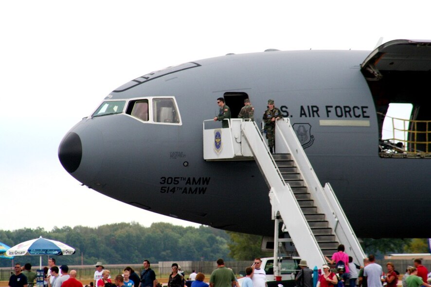People attending the Airpower Over The Midwest Airshow line up to look at a static display of a KC-10 Extender from the 305th Air Mobility Wing at Joint Base McGuire-Dix-Lakehurst, N.J., on Sept. 11, 2010, at Scott Air Force Base, Ill. Tens of thousands of people attended the two-day airshow at Scott AFB. The KC-10 is the Air Force's largest air refueling tanker and is mainly stationed at two Air Mobility Command bases to include Joint Base MDL and Travis Air Force Base, Calif. (U.S. Air Force Photo/Master Sgt. Scott T. Sturkol)