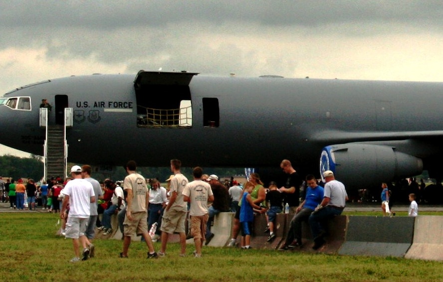 People attending the Airpower Over The Midwest Airshow line up to look at a static display of a KC-10 Extender from the 305th Air Mobility Wing at Joint Base McGuire-Dix-Lakehurst, N.J., on Sept. 11, 2010, at Scott Air Force Base, Ill. Tens of thousands of people attended the two-day airshow at Scott AFB. The KC-10 is the Air Force's largest air refueling tanker and is mainly stationed at two Air Mobility Command bases to include Joint Base MDL and Travis Air Force Base, Calif. (U.S. Air Force Photo/Master Sgt. Scott T. Sturkol)