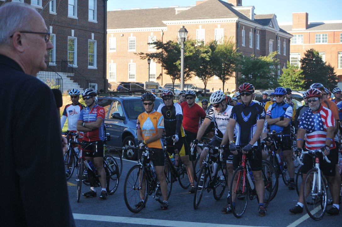 Chaplain David Sparks, Air Force Mortuary Affairs Operations Center, conducted a 9/11 tribute and a Blessing of the Bikes ceremony at Legislative Mall Sept. 11 as part of Dover's 24th Annual Amish Bike Tour. Several Team Dover members participated in the 15 to 100-mile event, including Master Sgt. Brad Bronov (front row wearing Air Force symbol on shirt), 436th Airlift Wing. (U.S. Air Force photo by Master Sgt. Veronica A. Aceveda/Released)