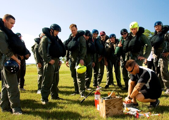 EGLIN AIR FORCE BASE, Fla. -- Staff Sgt. Joseph White, 46th Operation Support Squadron’s life support flight,  teaches students how to use flares during a water survival training class Sept. 10, at Post'l Point  More than a dozen aircrew members received the training that day.  (U.S. Air Force photo/Staff Sgt. Felicia L. Welch) 