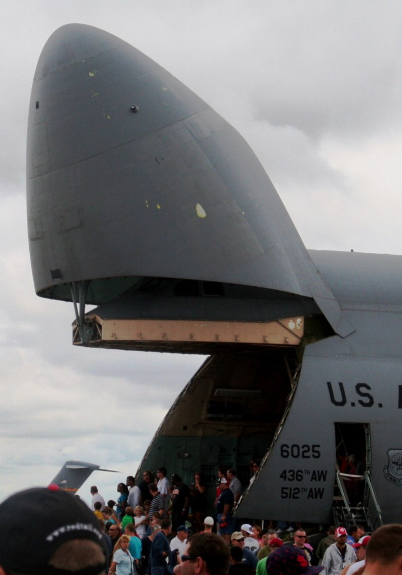 People attending the Airpower Over The Midwest Airshow look at a static display of a C-5M Super Galaxy from Dover Air Force Base, Del., on Sept. 11, 2010, at Scott AFB, Ill. Tens of thousands of visitors stopped at Scott AFB for the two-day airshow. The C-5M Super Galaxy has the latest upgrades in communications, navigation, surveillance and air traffic management, autopilot and safety equipment for the C-5 airframe. (U.S. Air Force Photo/Master Sgt. Scott T. Sturkol)