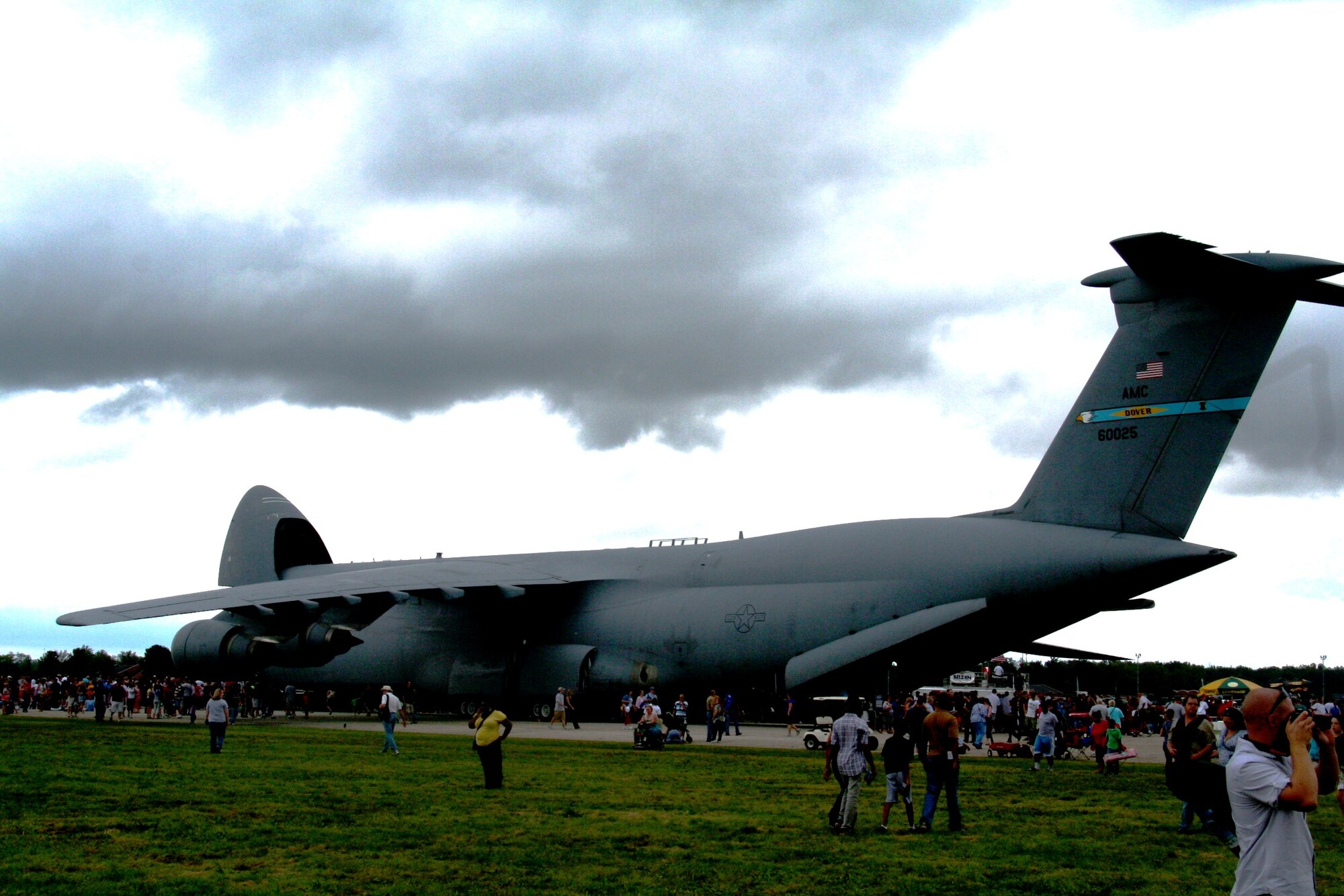 People attending the Airpower Over The Midwest Airshow look at a static display of a C-5M Super Galaxy from Dover Air Force Base, Del., on Sept. 11, 2010, at Scott AFB, Ill. Tens of thousands of visitors stopped at Scott AFB for the two-day airshow. The C-5M Super Galaxy has the latest upgrades in communications, navigation, surveillance and air traffic management, autopilot and safety equipment for the C-5 airframe. (U.S. Air Force Photo/Master Sgt. Scott T. Sturkol)